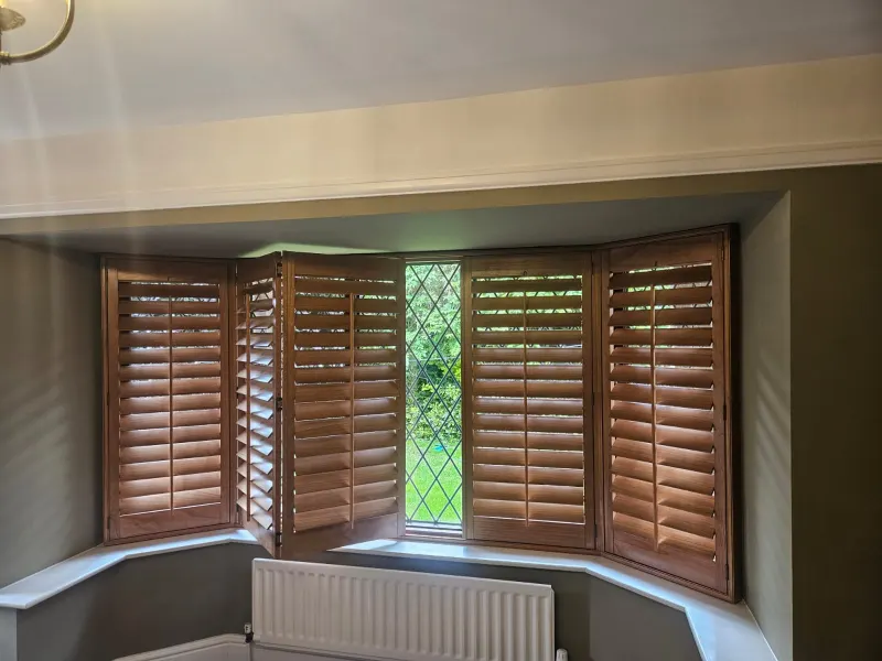 Bay window plantation shutters in a Grimsby home