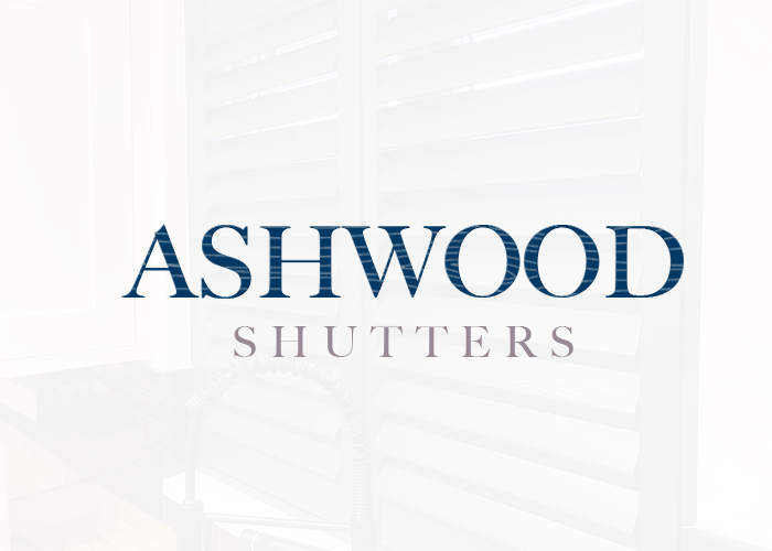 Logo for the Ashwood Shutters range, with a semi-transparent shutter in the background.