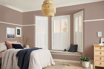 Panel style Shutters in a Bay Window