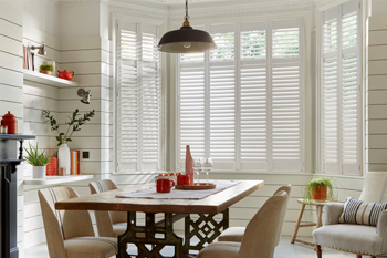 Full height Cleveland Shutters in a modern Dining Room