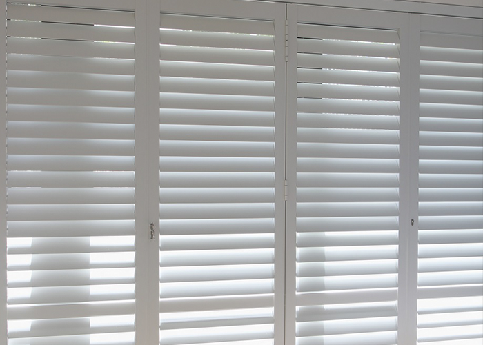 Full height Portchester Shutters in white