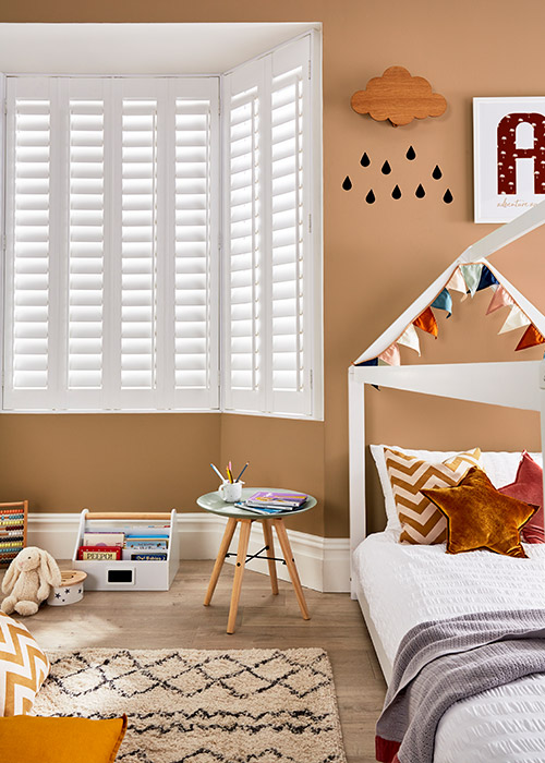 Square bay window Shutters in a Child's Bedroom
