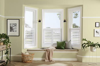 Closed Café style Shutters in a bay window