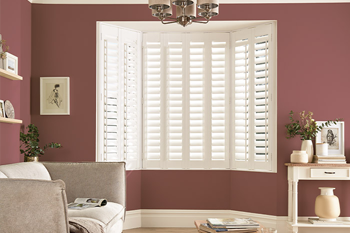 Solid Wood Plantation Shutters in a bay window