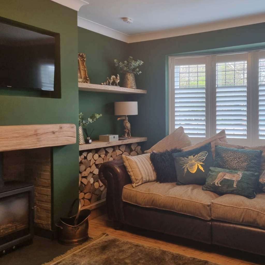 A warm, comfortable living room with Shutters