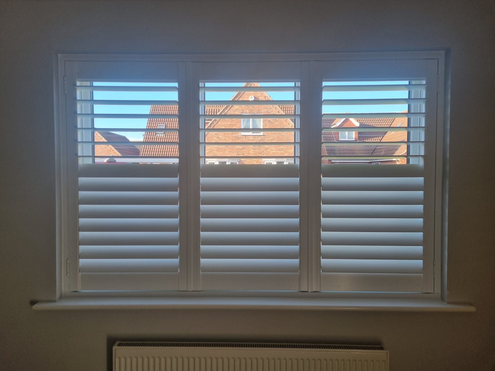 Bespoke plantation shutters by Shutters of Elegance.