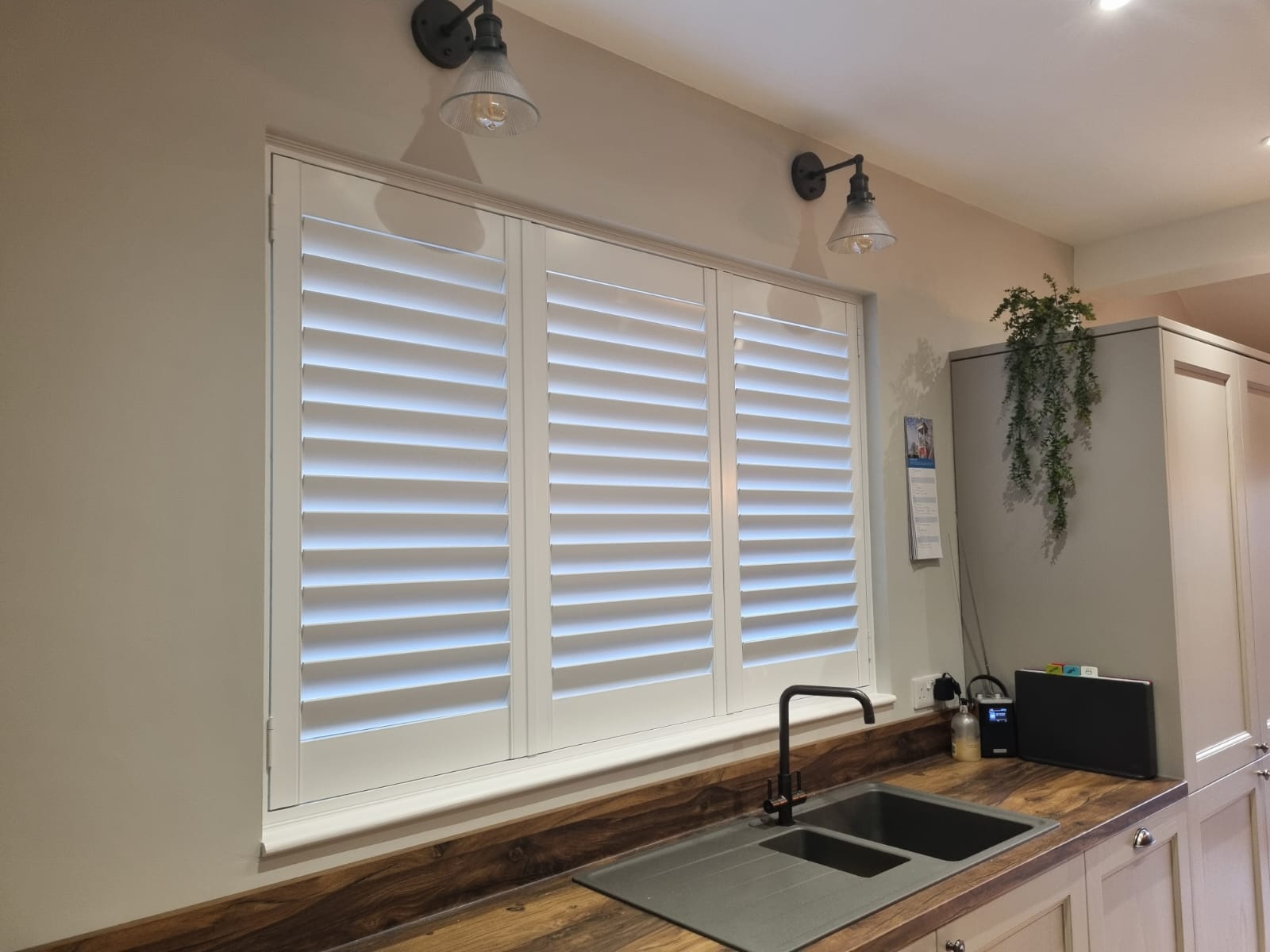Image of plantation shutters in a modern kitchen